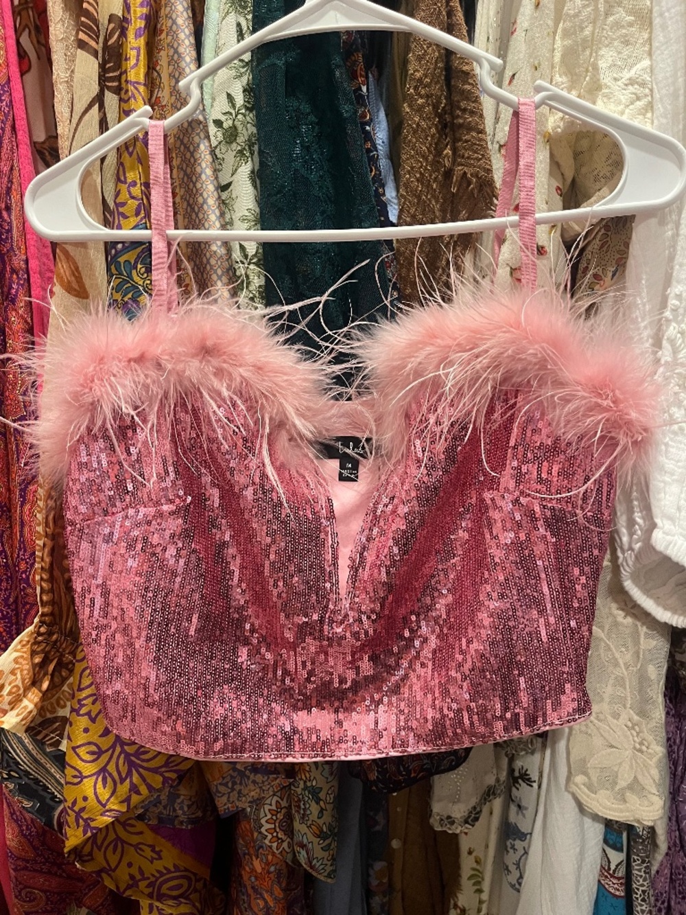 Pink sequence and feather crop top.